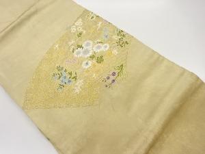 地紙に草花・七宝模様織出し名古屋帯